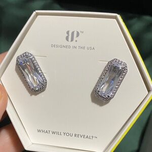 Cubic zirconia earrings on hematite